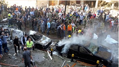 Iran revises death toll of twin blasts to 95